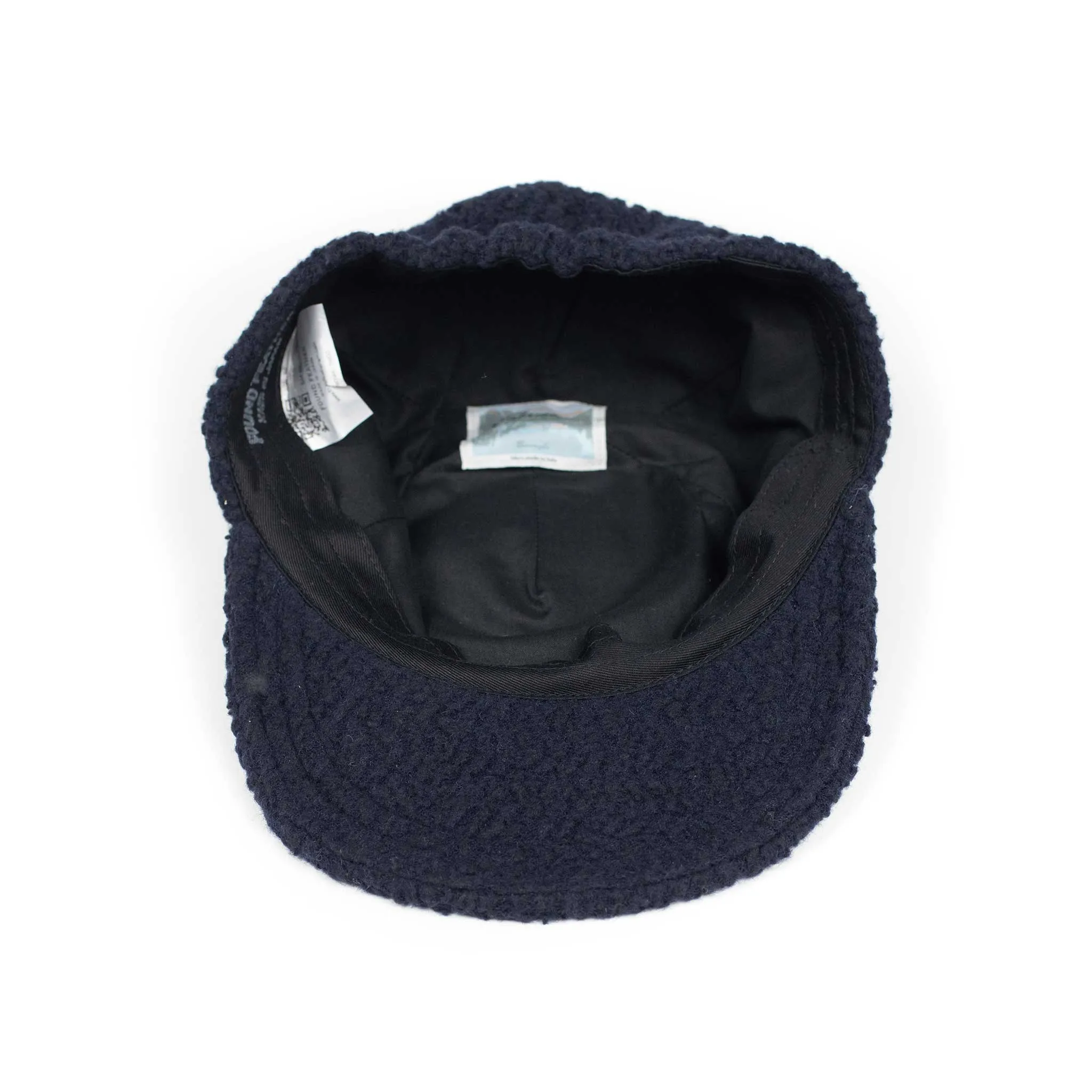 2 panel trucker cap in navy Calamai fleece chevron